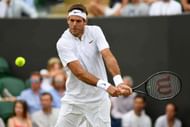 LONDON, ENGLAND - JULY 04:  Juan Martin Del Potro of Argentina plays a backhand during the Gentlemen's Singles first round match against Thanasi Kokkinakis of Australia on day two of the Wimbledon Lawn Tennis Championships at the All England Lawn Tennis and Croquet Club on July 4, 2017 in London, England.  (Photo by Shaun Botterill/Getty Images)